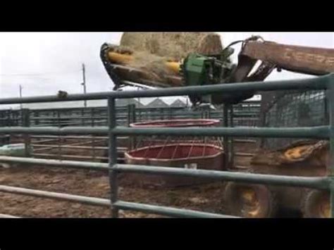 skid steer bale feeder|hustler mounted bales.